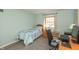 Small bedroom with carpeting and desk at 9080 Dewberry Ct, Indianapolis, IN 46260