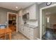 View of updated kitchen with stainless steel microwave and granite countertops at 9080 Dewberry Ct, Indianapolis, IN 46260