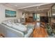 Inviting living room with wood floors, neutral decor, and ample natural light at 9080 Dewberry Ct, Indianapolis, IN 46260