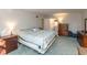 Spacious main bedroom boasts ample closet space and serene, neutral decor at 9080 Dewberry Ct, Indianapolis, IN 46260