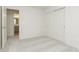 Bedroom featuring carpet floor, closet with sliding doors, and view of a bathroom at 9730 Behner Dr, Fishers, IN 46250