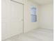 Bedroom featuring carpet floor, closet with sliding doors, and a window at 9730 Behner Dr, Fishers, IN 46250