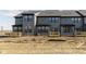 Exterior of new homes with decks and landscaped yard at 9742 Behner Dr, Fishers, IN 46250