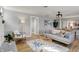 Cozy living room with hardwood floors, stylish decor, and comfortable seating at 1195 W Edgewood Ave, Indianapolis, IN 46217
