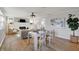 Combined living and dining area with natural light, decor and hardwood flooring at 1195 W Edgewood Ave, Indianapolis, IN 46217