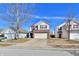 Attractive two-story home featuring a classic design, attached garage, and landscaped front yard at 120 White Lick Dr, Indianapolis, IN 46227