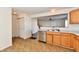 Bright kitchen with stainless steel appliances and a view into the living room at 120 White Lick Dr, Indianapolis, IN 46227
