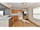Modern kitchen with stainless steel appliances, marble countertops, and abundant natural light at 120 White Lick Dr, Indianapolis, IN 46227