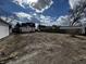 Spacious lot with a view of the back of the house and the detached garage at 120 Wisconsin St, Indianapolis, IN 46225