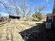 Large backyard with a shed, ready for landscaping, gardening, or outdoor enjoyment at 1410 E 8Th St, Anderson, IN 46012