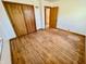 Bedroom with Hardwood floors with inlay design and closet space at 1410 E 8Th St, Anderson, IN 46012