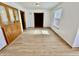 Dining room with wood flooring, built in china cabinet, and natural light at 1410 E 8Th St, Anderson, IN 46012