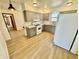 Updated kitchen featuring gray cabinets and modern appliances at 1410 E 8Th St, Anderson, IN 46012