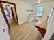 Mud room with a utility sink and a wooden changing table at 1410 E 8Th St, Anderson, IN 46012