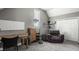 Comfortable bedroom featuring a recliner, desk, and storage, offering a relaxing and functional space at 1424 S New Jersey St, Indianapolis, IN 46225