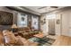 Cozy living room featuring hardwood floors, comfortable furniture, and natural light at 1424 S New Jersey St, Indianapolis, IN 46225