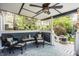 Charming outdoor porch with comfortable wicker seating and stylish decor for relaxation and enjoyment at 1424 S New Jersey St, Indianapolis, IN 46225