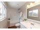Bright bathroom with shower-tub, vanity, and ample natural light at 1431 W Edgewood Ave, Indianapolis, IN 46217
