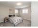 Bedroom with neutral walls, carpet, and a comfortable bed at 1431 W Edgewood Ave, Indianapolis, IN 46217