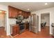 Kitchen features stainless steel appliances, including a gas range, microwave, and refrigerator at 1431 W Edgewood Ave, Indianapolis, IN 46217