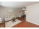 Living room with neutral tones, hardwood floors, and large windows at 1431 W Edgewood Ave, Indianapolis, IN 46217