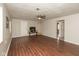 Open living room with fireplace, wood floors, and lots of space at 1431 W Edgewood Ave, Indianapolis, IN 46217