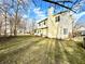 Large backyard featuring a lawn, trees, and the back of the home at 1470 Northern Valley Trl, Avon, IN 46123