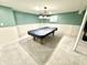 Basement featuring carpeting and a pool table with a black cover at 1470 Northern Valley Trl, Avon, IN 46123