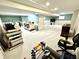 Spacious basement area with carpeting and ample room for various activities at 1470 Northern Valley Trl, Avon, IN 46123