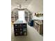 Bright attic bonus room with built-in bookshelves and ample workspace, perfect for crafts or hobbies at 1470 Northern Valley Trl, Avon, IN 46123