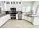Modern kitchen featuring stainless steel appliances and lots of white cabinets at 1470 Northern Valley Trl, Avon, IN 46123