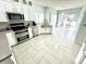 Spacious kitchen featuring stainless steel appliances, and tile flooring at 1470 Northern Valley Trl, Avon, IN 46123
