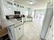 Bright open kitchen with stainless steel appliances and tile flooring at 1470 Northern Valley Trl, Avon, IN 46123