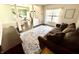 Spacious living room has hardwood floors, comfortable sofa, and staircase view at 1470 Northern Valley Trl, Avon, IN 46123