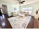 Comfortable living room showcases a large window and sectional sofa at 1470 Northern Valley Trl, Avon, IN 46123