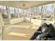 Bright screened porch featuring a ceiling fan and comfortable seating area at 1470 Northern Valley Trl, Avon, IN 46123