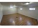 Spacious basement featuring multiple windows providing natural light and ventilation at 1509 S Hawthorne Ln, Indianapolis, IN 46203