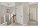 Upstairs hallway featuring new carpeting, a modern chandelier, and access to several bedrooms at 15297 Fairlands Dr, Westfield, IN 46074