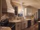 Updated kitchen features sleek countertops and a modern color palette at 16 Torrey Pine Dr, Brownsburg, IN 46112