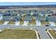 An aerial view showcasing a well-planned residential community with a variety of home styles and streetscapes at 16808 Audley Ave, Westfield, IN 46074