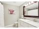 Bright bathroom featuring a double vanity with quartz countertops and modern fixtures at 16808 Audley Ave, Westfield, IN 46074