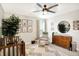Serene Bedroom room featuring a plush armchair, dresser, and decorative plants at 16808 Audley Ave, Westfield, IN 46074