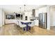 Spacious kitchen with seating around a large island, perfect for gathering and entertaining at 16808 Audley Ave, Westfield, IN 46074