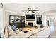 Comfortable living room with a fireplace, large TV, and a plush sofa ideal for relaxation at 16808 Audley Ave, Westfield, IN 46074