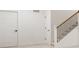 Basement staircase and multiple doors, one with black hardware at 19854 Chatham Shore Ln, Westfield, IN 46074