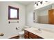 Bathroom with brown wood trim and a vanity at 211 Deborah Ln, Whiteland, IN 46184