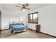 Bedroom with a ceiling fan, natural light and hardwood trim at 211 Deborah Ln, Whiteland, IN 46184