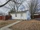Detached garage providing ample storage space and featuring a convenient side entrance at 2113 Silver St, Anderson, IN 46012
