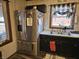 Kitchen featuring stainless steel appliances and black cabinets at 2113 Silver St, Anderson, IN 46012