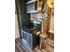 Kitchen featuring an electric range with black cabinetry at 2113 Silver St, Anderson, IN 46012